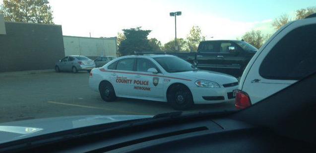 County officer at gun store